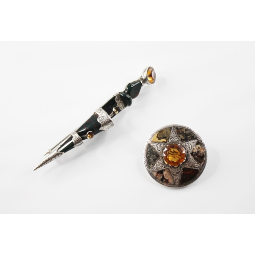 109 - A Victorian Scottish silver hardstone and paste set dirk brooch, modelled as a traditional dirk, set... 