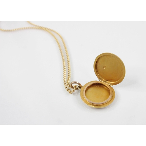 111 - A Victorian 15ct gold locket pendant, of circular form, opening to reveal a vacant aperture, stamped... 