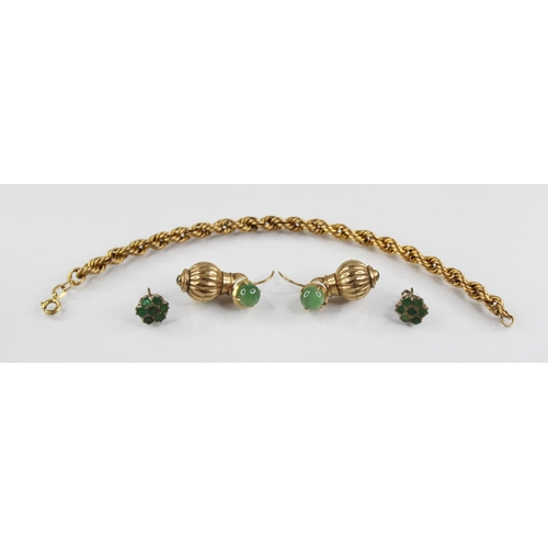 112 - A pair of gold coloured earring droppers, each of reeded spherical form set with an emerald coloured... 