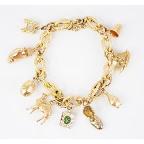 114 - An Italian 18ct gold curb link bracelet by Nicolis Cola, comprising alternating engine turned and pl... 