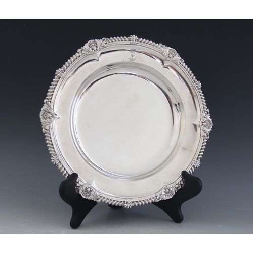 29 - A George IV silver soup plate, Waterhouse, Hodson & Co, Sheffield 1824, bearing the crest for the Ea... 