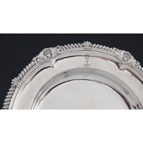 29 - A George IV silver soup plate, Waterhouse, Hodson & Co, Sheffield 1824, bearing the crest for the Ea... 