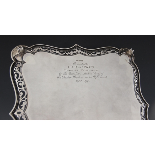 3 - An Edwardian silver salver, James Dixon & Sons Ltd, Sheffield 1905, of square form with pierced shap... 