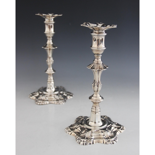 36 - A pair of George III silver candlesticks, John Hyatt & Charles Semore, London 1760, each with knoppe... 