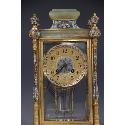 573 - A late 19th/early 20th century French champlevé and green onyx clock garniture, the 11cm gilt metal ... 