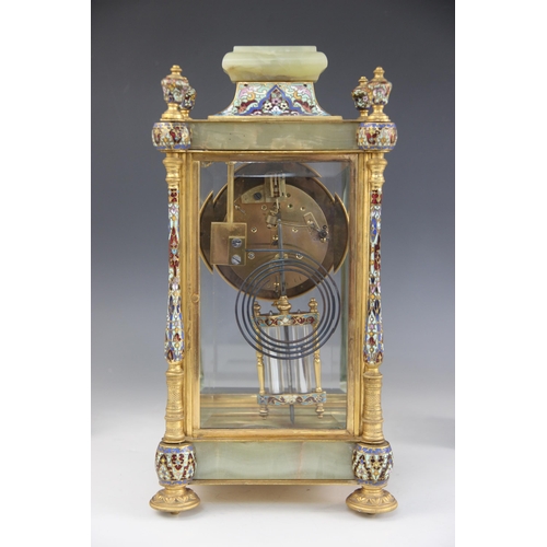 573 - A late 19th/early 20th century French champlevé and green onyx clock garniture, the 11cm gilt metal ... 