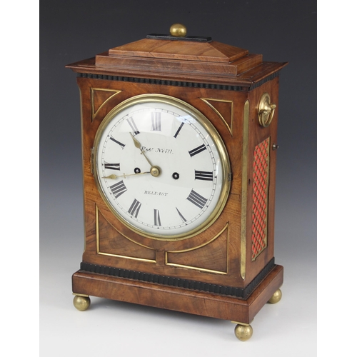 575 - A Regency mahogany bracket clock by Robert Neill, Belfast, the stepped cornice with a sphere finial ... 