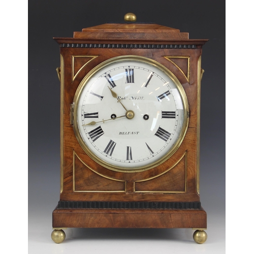 575 - A Regency mahogany bracket clock by Robert Neill, Belfast, the stepped cornice with a sphere finial ... 