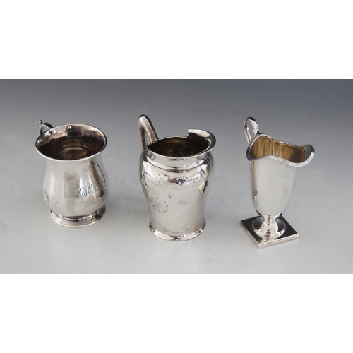 58 - An Art Nouveau silver milk jug, Ridley Brothers & Merton, Birmingham 1904, of inverted baluster form... 