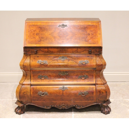 583 - A figured walnut Dutch style bombe bureau, late 20th century, the cross banded fall front opening to... 