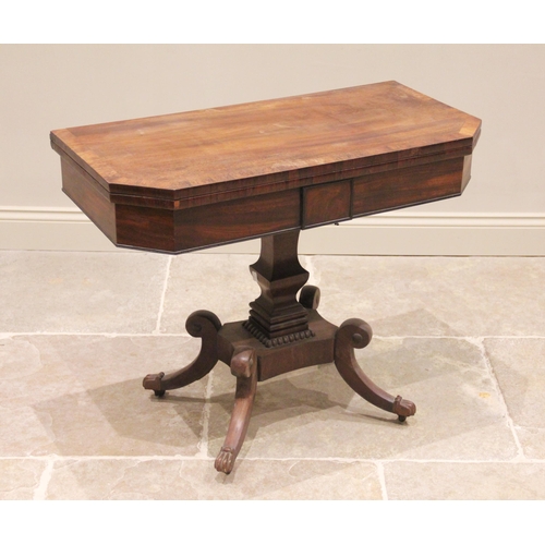 599 - A George IV mahogany and rosewood cross banded card table, the rectangular hinged top with canted fr... 