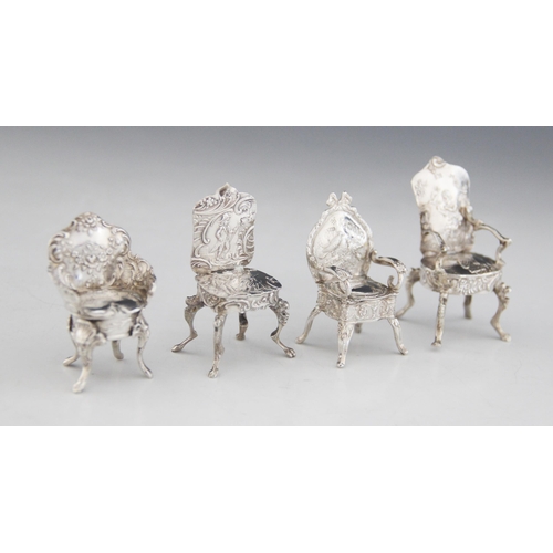 60 - A selection of continental miniature silver and silver coloured doll’s house furniture, to include a... 