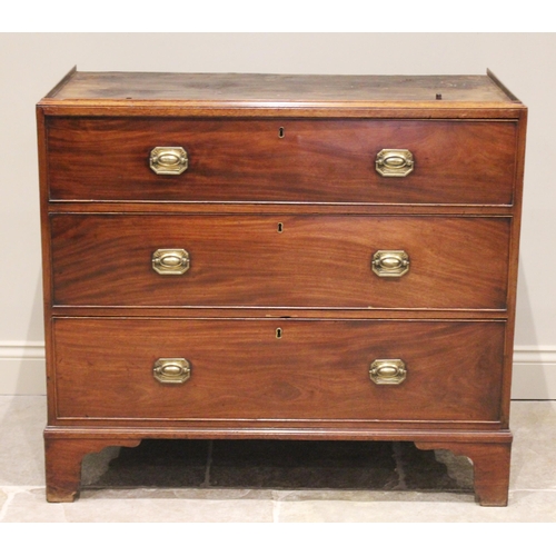 601 - A late George III mahogany chest on chest, the moulded and simulated dentil cornice above an arrange... 