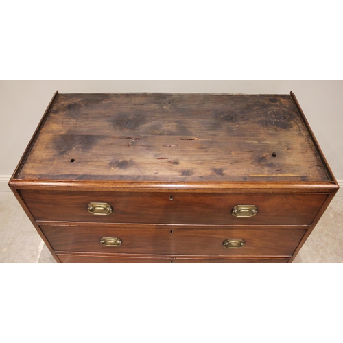 601 - A late George III mahogany chest on chest, the moulded and simulated dentil cornice above an arrange... 