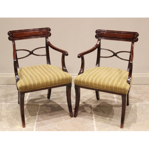 609 - A harlequin set of sixteen George IV style mahogany dining chairs, by Maple & Co, circa 1925, each w... 