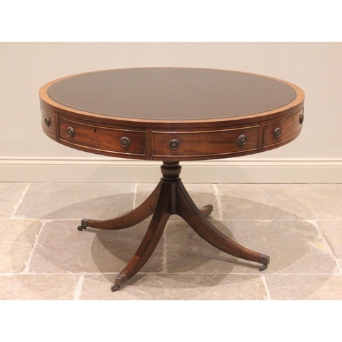 616 - A Regency style mahogany library drum table, late 20th century, the gilt tooled inset skiver above s... 