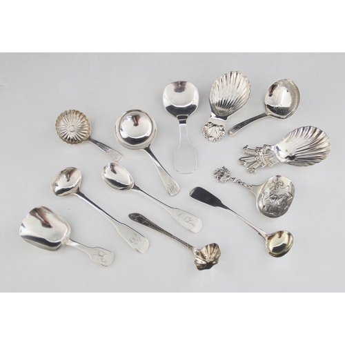 62 - A selection of George III and later silver caddy spoons and teaspoons, to include an Irish silver ca... 