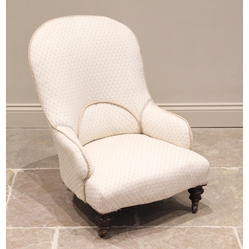 626 - A Victorian upholstered low seat nursing chair, in lattice pattern ivory coloured fabric, the arched... 