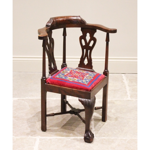 628 - A Chippendale revival child's mahogany corner chair, late 19th/early 20th century, the curved top ra... 