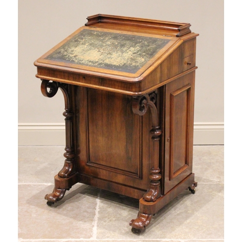 638 - An early Victorian rosewood davenport, the three quarter gallery above a skiver inset writing slope,... 