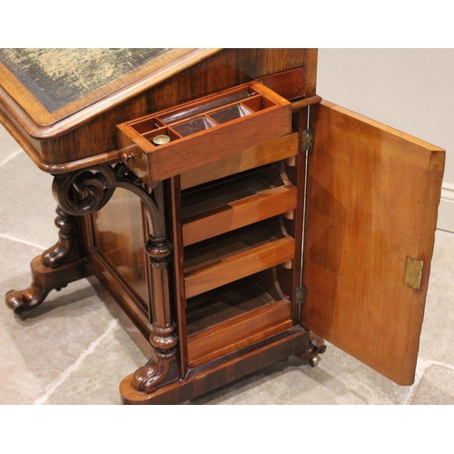 638 - An early Victorian rosewood davenport, the three quarter gallery above a skiver inset writing slope,... 