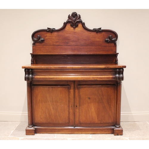 642 - A Victorian mahogany chiffonier sideboard, the shaped raised back with foliate moulded detail, above... 