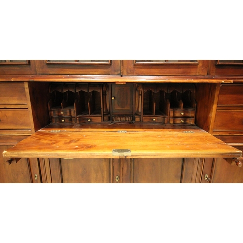 646 - A large 19th century style breakfront mahogany secretaire library bookcase, late 20th century, the m... 