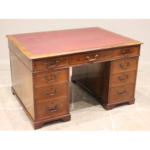 647 - A Victorian mahogany twin-pedestal desk, the rectangular moulded top with a later inset skiver over ... 