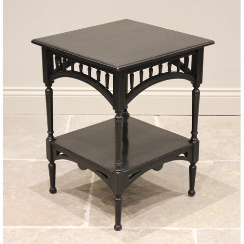 668 - An Arts & Crafts ebonised occasional table, in the manner of E.W Godwin, circa 1900, the square moul... 