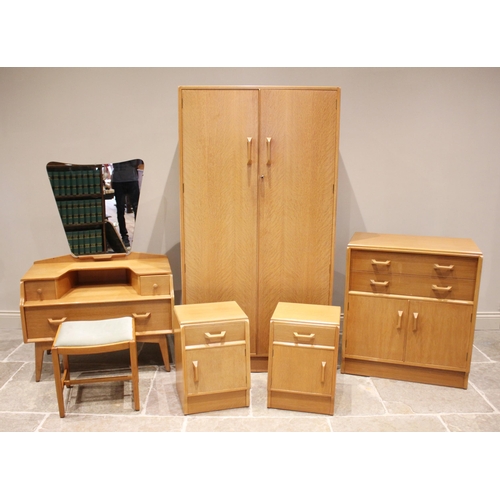 673 - A G-Plan Brandon five piece light oak bedroom suite, mid 20th century, comprising; a pair of bedside... 