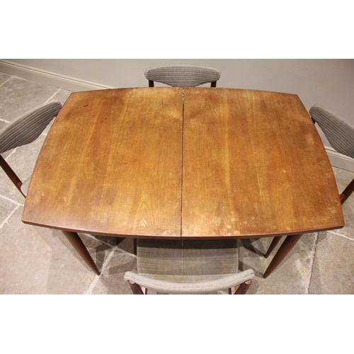 677 - A mid 20th century teak dining table, of Scandinavian design by White and Newton, Portsmouth, of swe... 