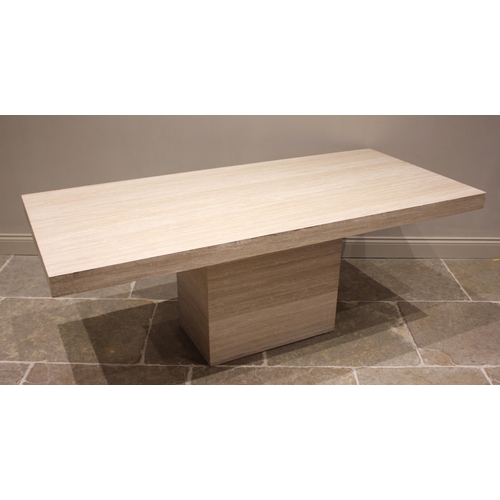 680 - A contemporary limestone table, late 20th/early 21st century, the rectangular top raised upon a sing... 