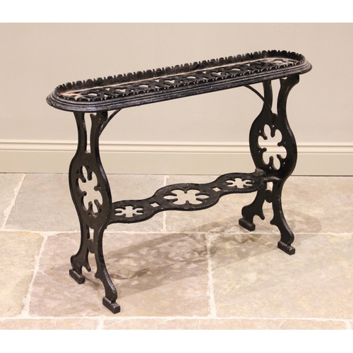 681 - A Victorian Coalbrookdale style painted cast iron conservatory plant stand, the galleried oval open ... 