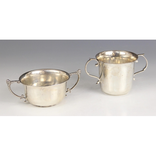 8 - A George V twin-handled silver cup, W W Kemp & Son Ltd, Birmingham 1929, of circular form with acorn... 