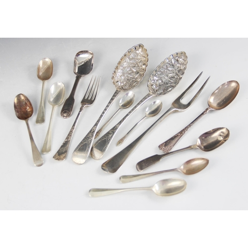 80A - A pair of Victorian silver fruit spoons, Philip Osment, Exeter 1863, the scalloped bowls embossed wi... 