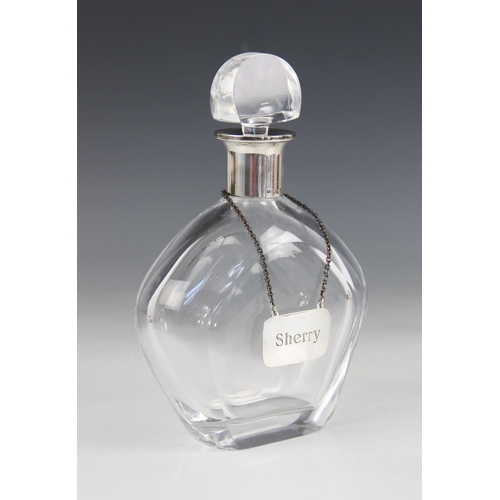 83 - A continental silver mounted glass decanter, the pentagonal body with plain polished mount stamped '... 