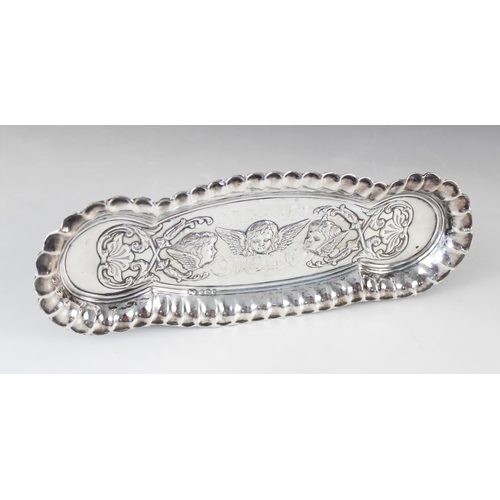 87 - An Edwardian silver hair pin tray, Deakin & Francis Ltd, Birmingham 1901, of elongated oval form wit... 