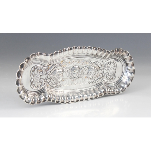 87 - An Edwardian silver hair pin tray, Deakin & Francis Ltd, Birmingham 1901, of elongated oval form wit... 