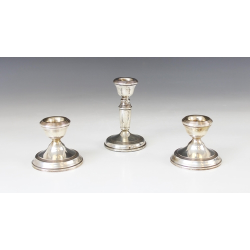 88 - A pair of silver mounted desk candlesticks, Broadway & Co, Birmingham 1967, tapered sconces with ree... 