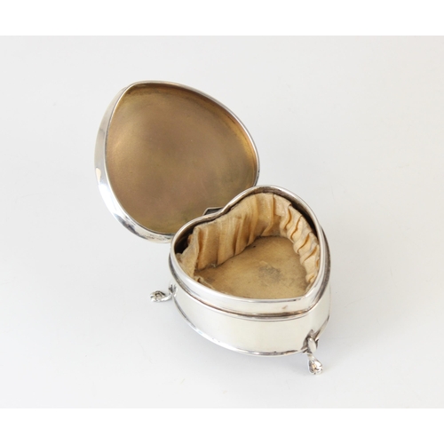 92 - A George V silver jewellery box, Clark & Sewell, Chester 1924, the heart-shaped box raised on three ... 