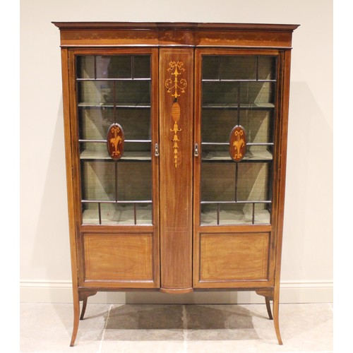 662 - An Edwardian inlaid mahogany display cabinet, inlaid with swags, urns and garlands in satinwood, the... 