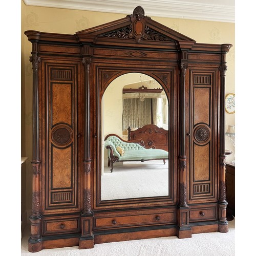 651 - A large and impressive late 19th century French figured walnut compactum wardrobe, of architectural ... 