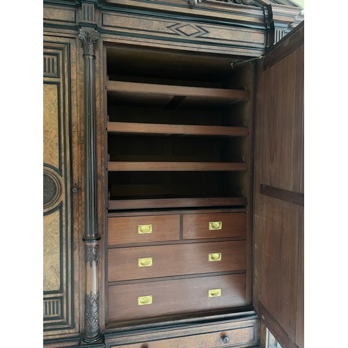 651 - A large and impressive late 19th century French figured walnut compactum wardrobe, of architectural ... 