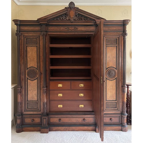 651 - A large and impressive late 19th century French figured walnut compactum wardrobe, of architectural ... 