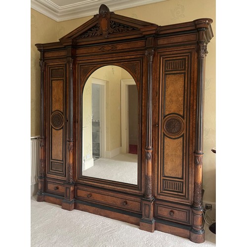 651 - A large and impressive late 19th century French figured walnut compactum wardrobe, of architectural ... 