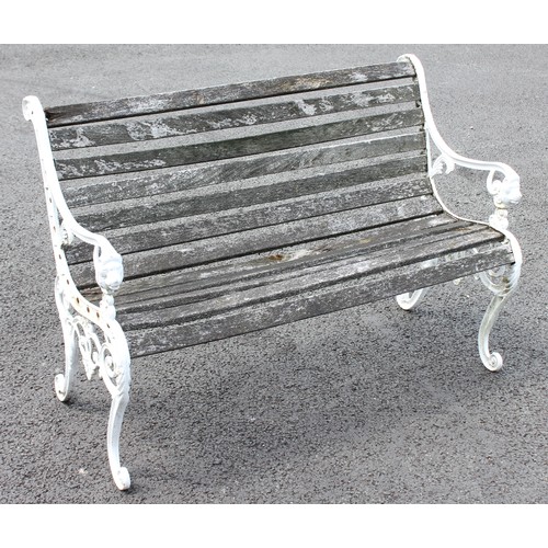 682 - A 19th century style painted metal and slatted hardwood bench, the supports cast with lion mask term... 