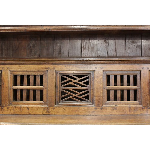 580 - A mid 18th century oak tridarn, of pegged construction, the superstructure canopy with a moulded cor... 