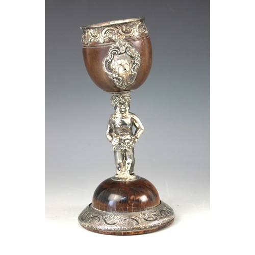 17A - An 17th/18th century and later silver coloured mounted coconut cup / chalice, probably continental, ... 