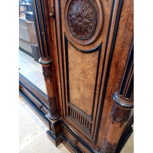 651 - A large and impressive late 19th century French figured walnut compactum wardrobe, of architectural ... 