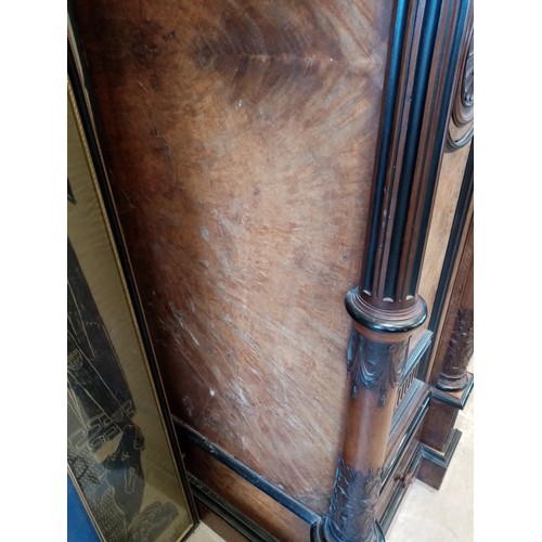 651 - A large and impressive late 19th century French figured walnut compactum wardrobe, of architectural ... 